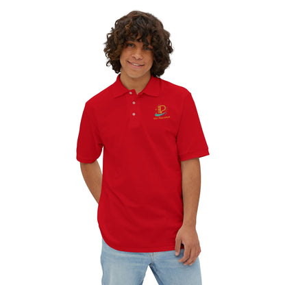 Men's custom piqué polo shirt with Coastal Coffee logo embroidered on chest