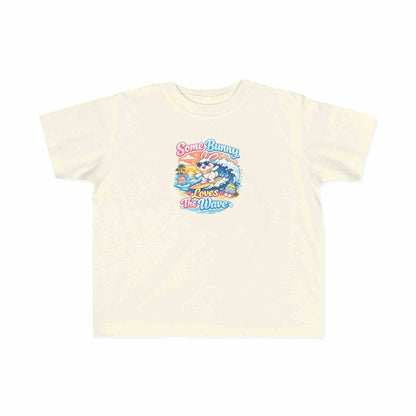Kids Easter t-shirt with surfing bunny and sunset wave titled Some Bunny Loves The Wave