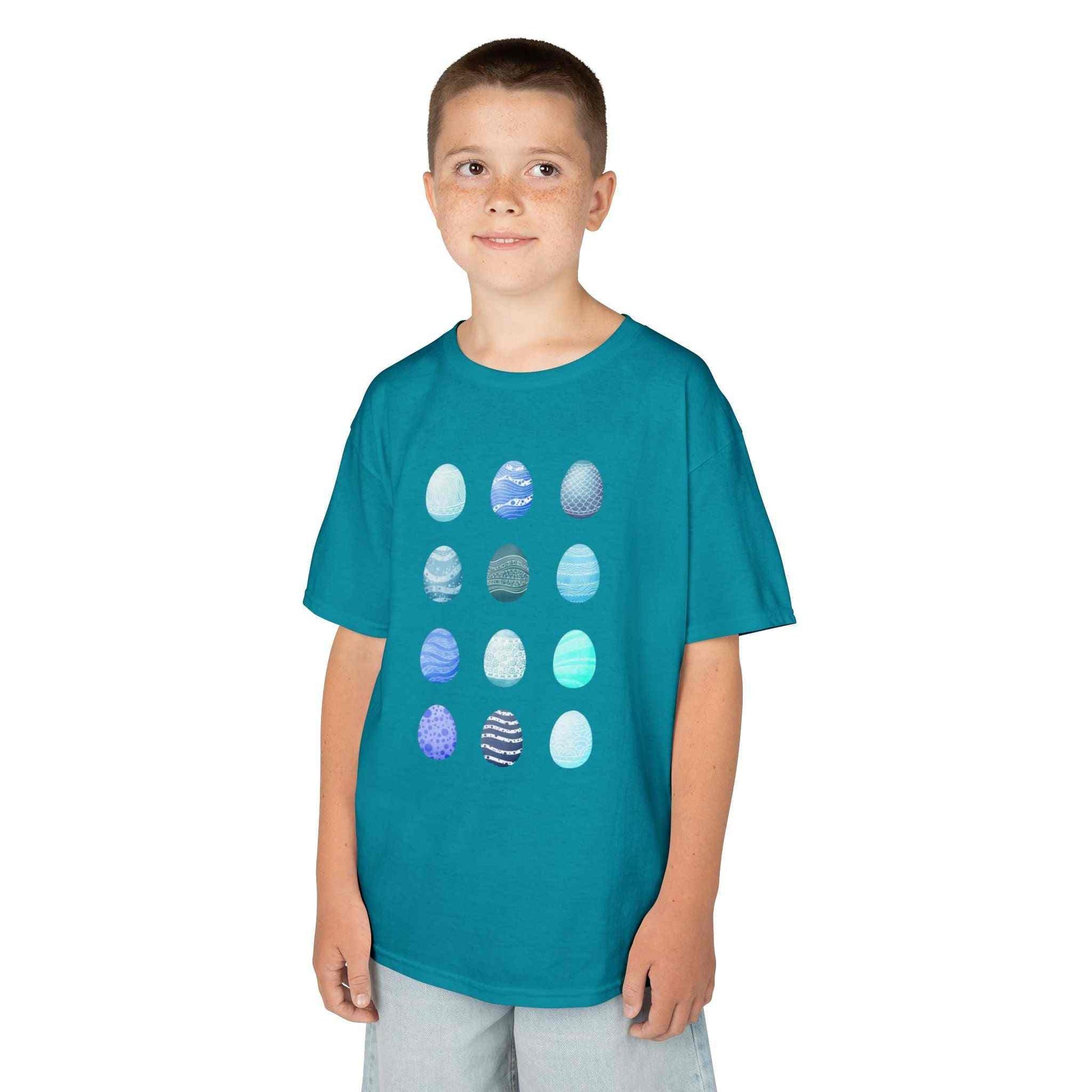 Kids tee with blue watercolor egg pattern on white cotton fabric