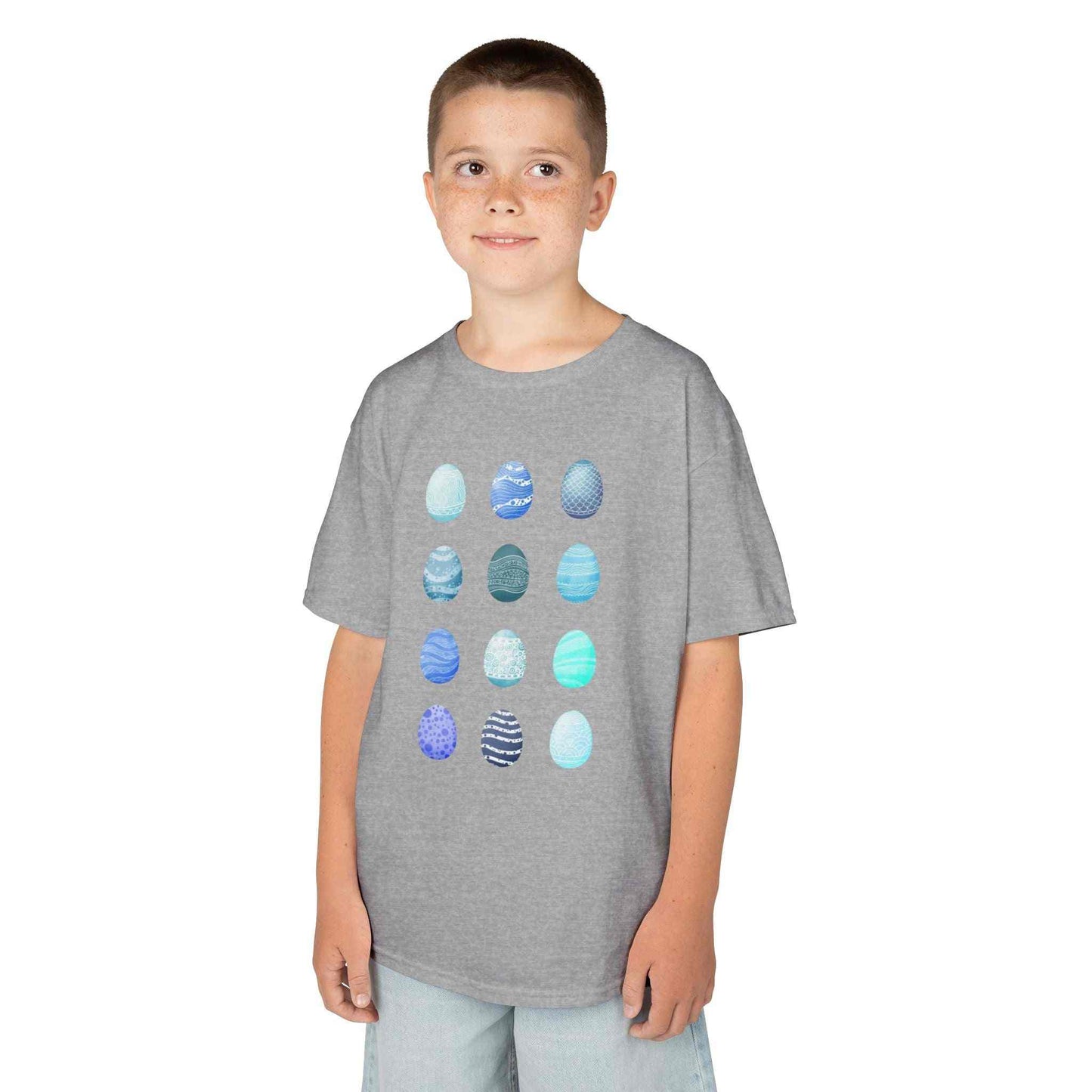 Kids tee with blue watercolor egg pattern on soft white cotton