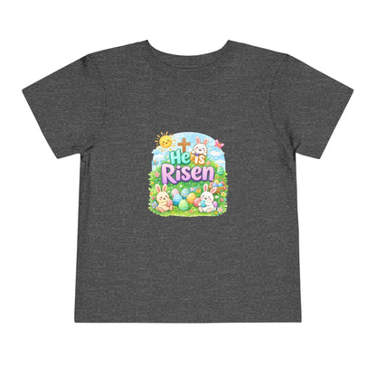 He Is Risen toddler tee with Easter bunny and cross design on soft pastel kids shirt