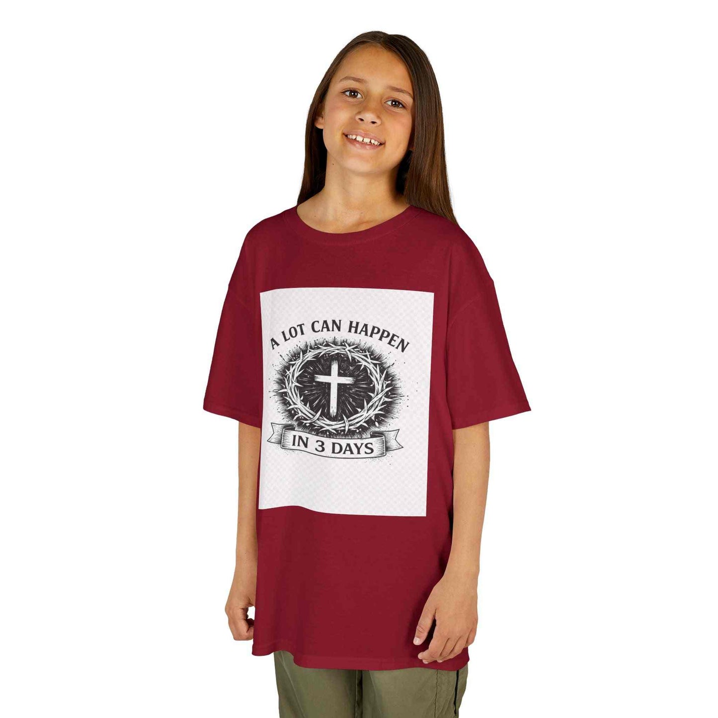 Kids tee with vintage cross design and "A Lot Can Happen in 3 Days" faith message on soft midweight cotton