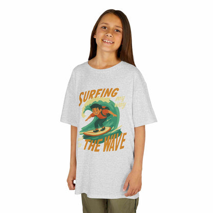 Kids Surfing The Wave T-Shirt with retro surf graphic, bright colors, and soft cotton fit for boys and girls