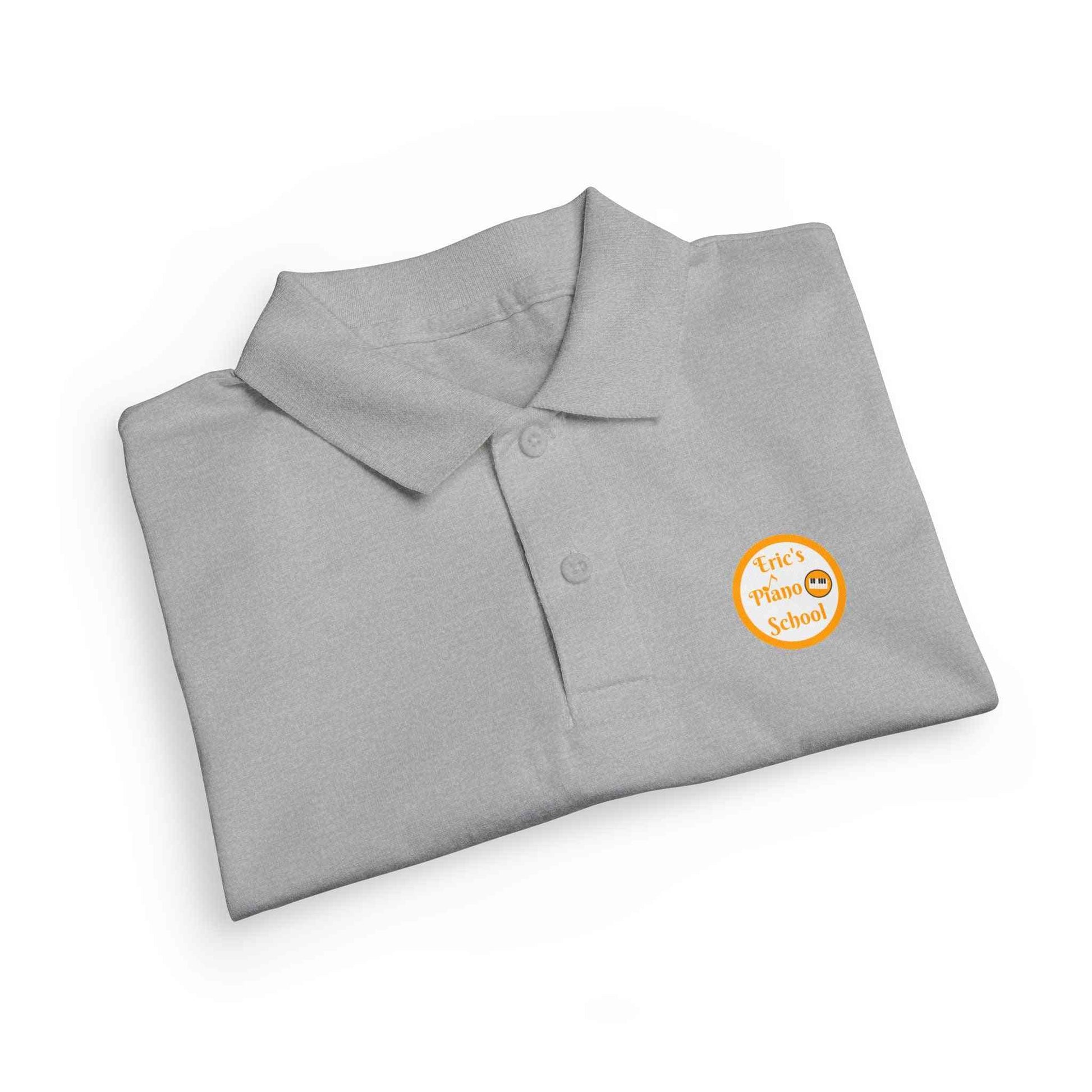 Youth polo shirt with gold Eric's Piano School logo for kids music lessons