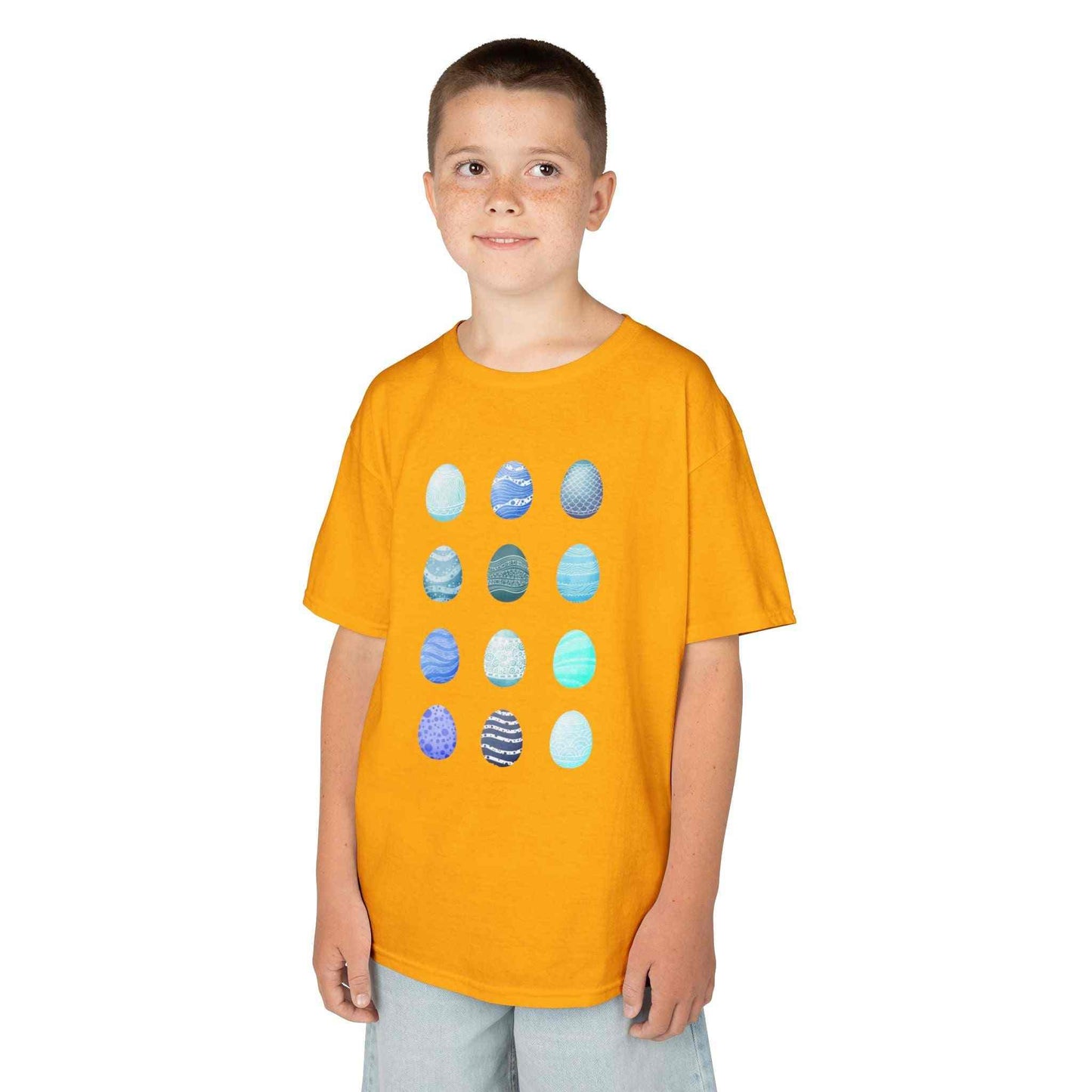 Kids tee with blue watercolor egg pattern on white cotton fabric