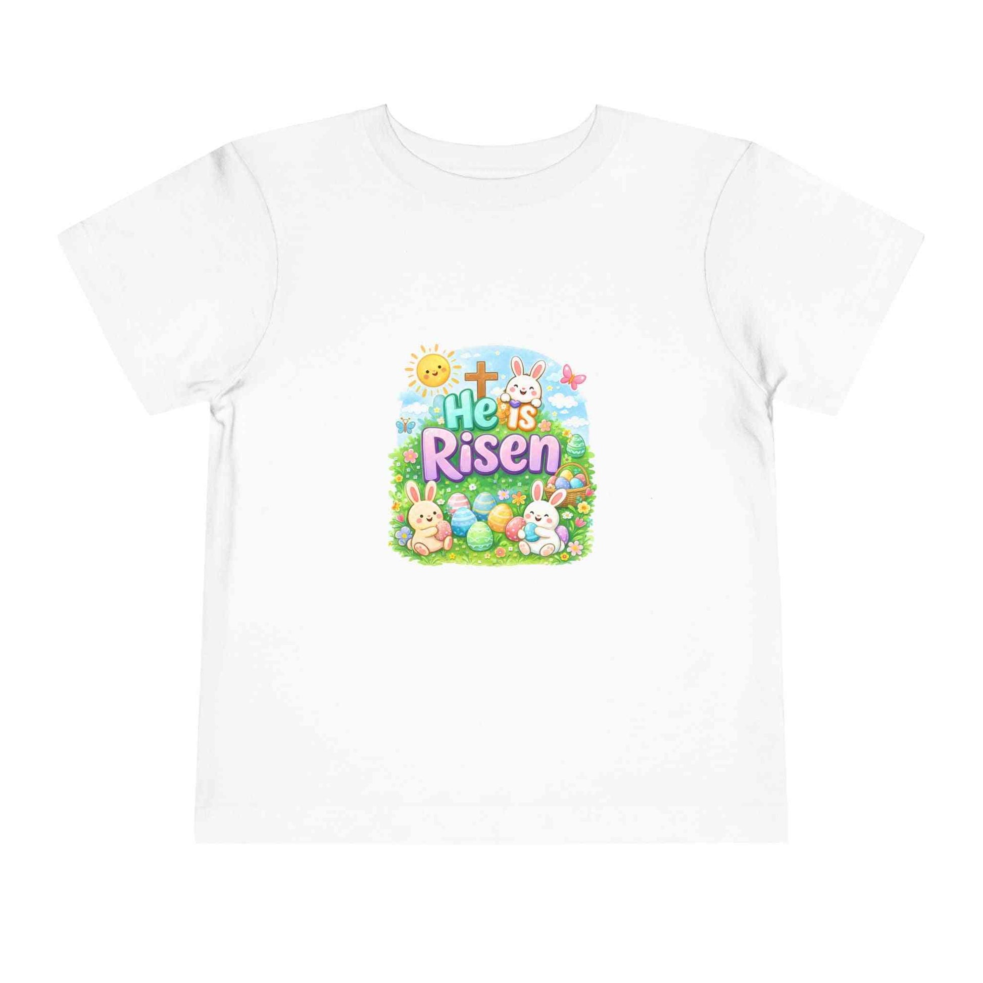 He Is Risen Toddler Tee with Easter bunny, cross, and pastel eggs design on lightweight cotton shirt