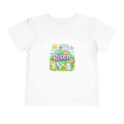 He Is Risen Toddler Tee with Easter bunny, cross, and pastel eggs design on lightweight cotton shirt