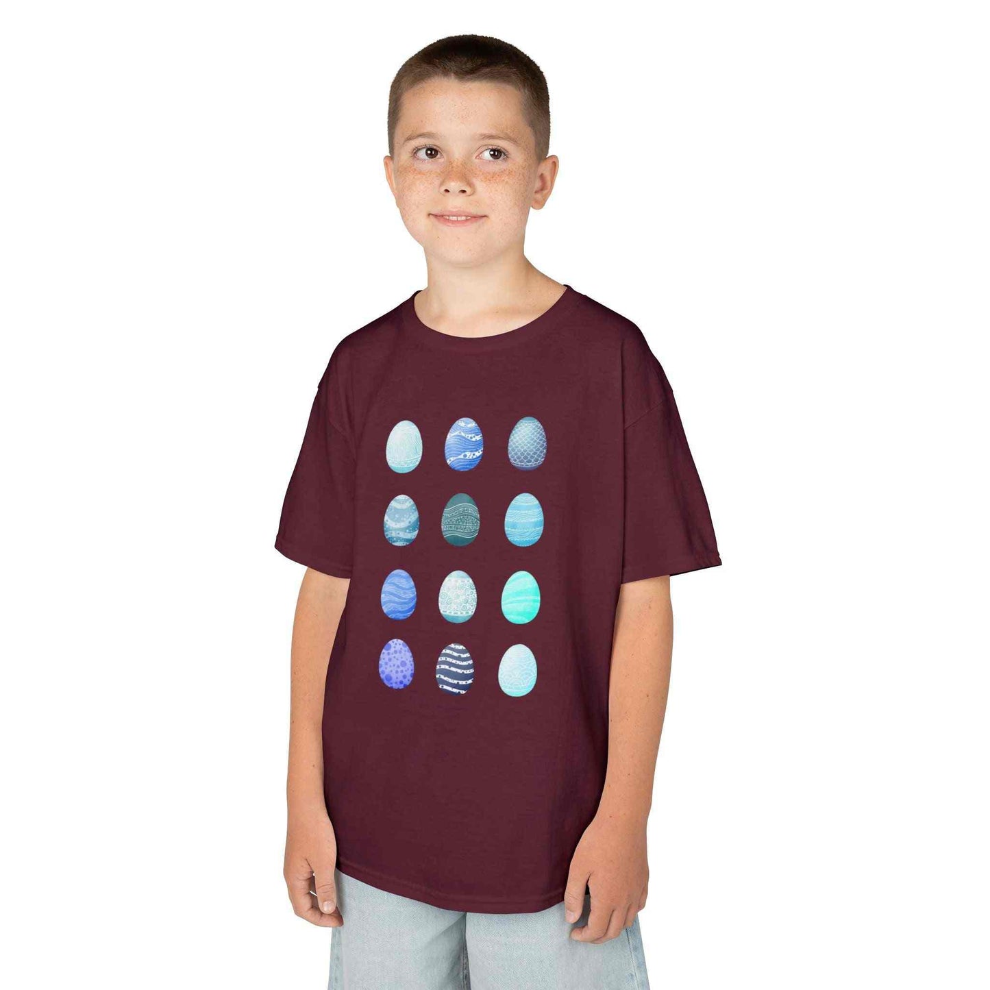 Kids tee with blue watercolor egg pattern on white cotton fabric