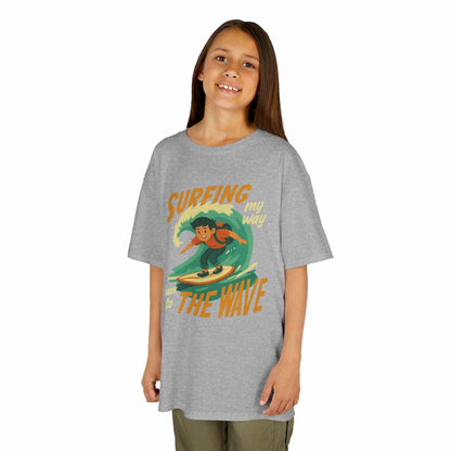 Kids Surfing The Wave T-Shirt with retro surfer graphic and vibrant colors on soft cotton