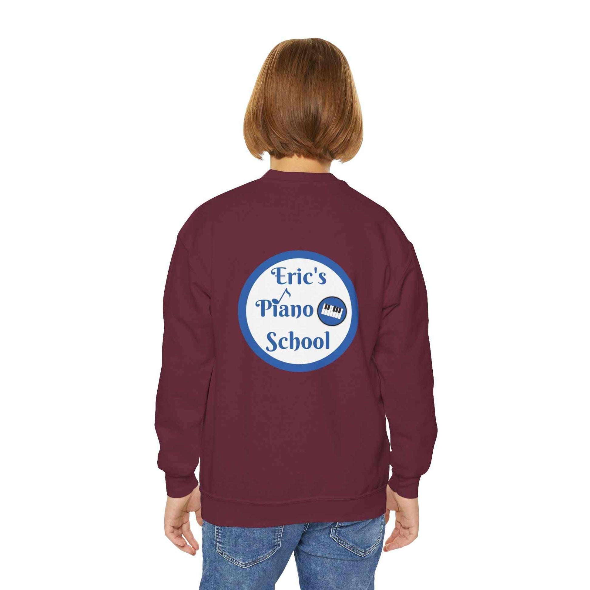 Cozy youth sweatshirt with piano school emblem, soft midweight fabric, and loose fit for music lessons and recitals