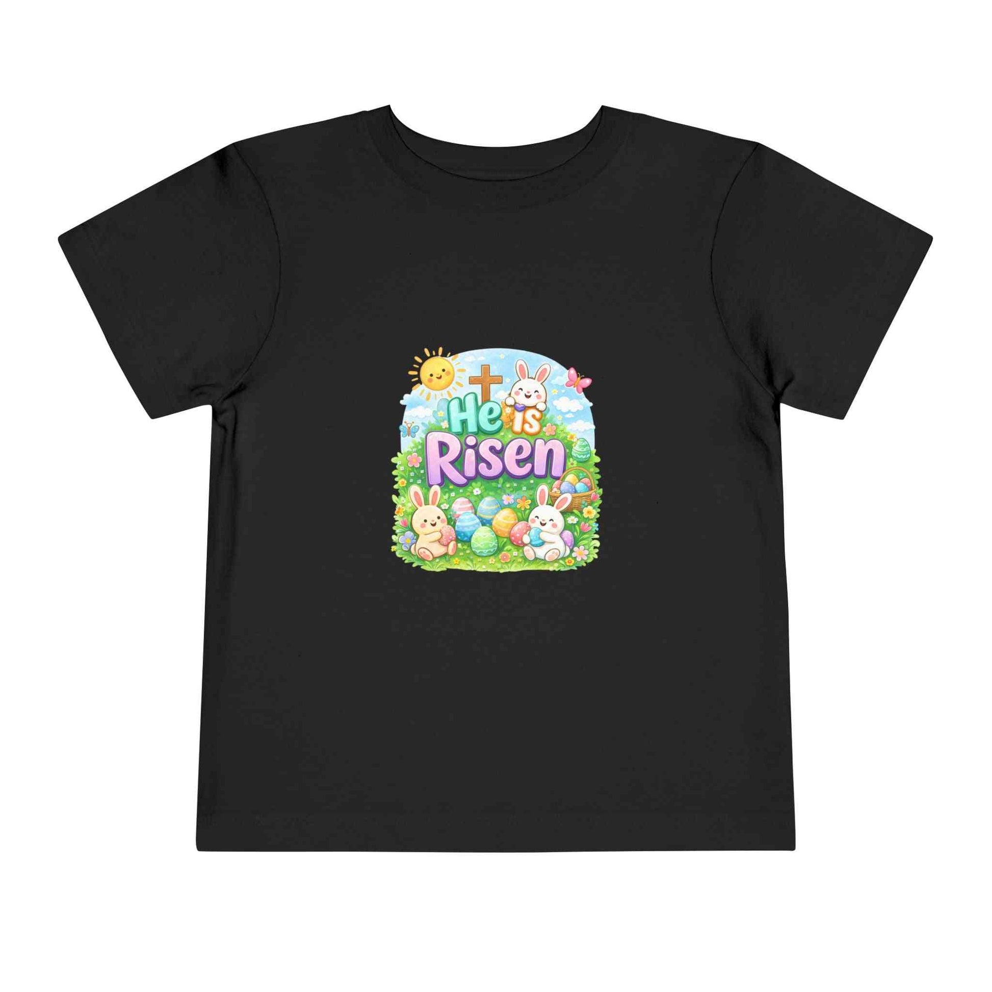He Is Risen toddler tee with Easter bunny, cross, and pastel eggs design for kids