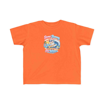 Some Bunny Loves The Wave Easter T-shirt with cute surfing bunny, pastel eggs, and sunset wave background