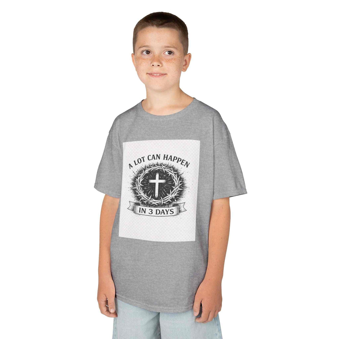 Kids tee with vintage cross and "A Lot Can Happen in 3 Days" faith design on soft cotton shirt