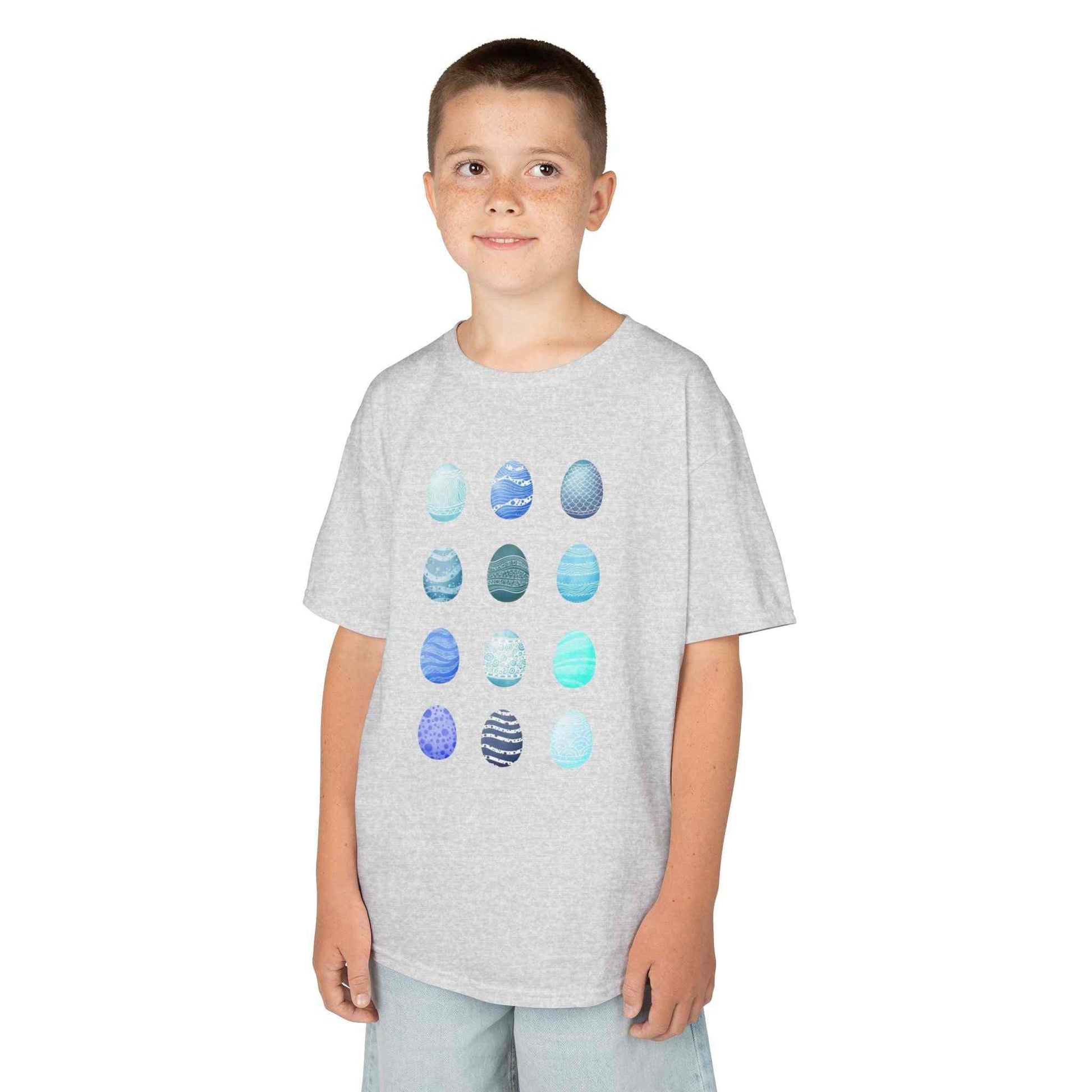 Kids tee with blue watercolor egg pattern on white cotton