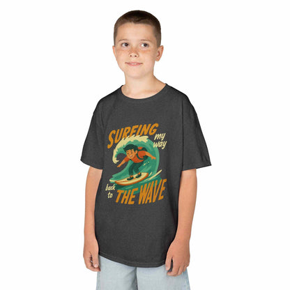 Kids Surfing The Wave T-Shirt with retro surfer graphic and vibrant colors