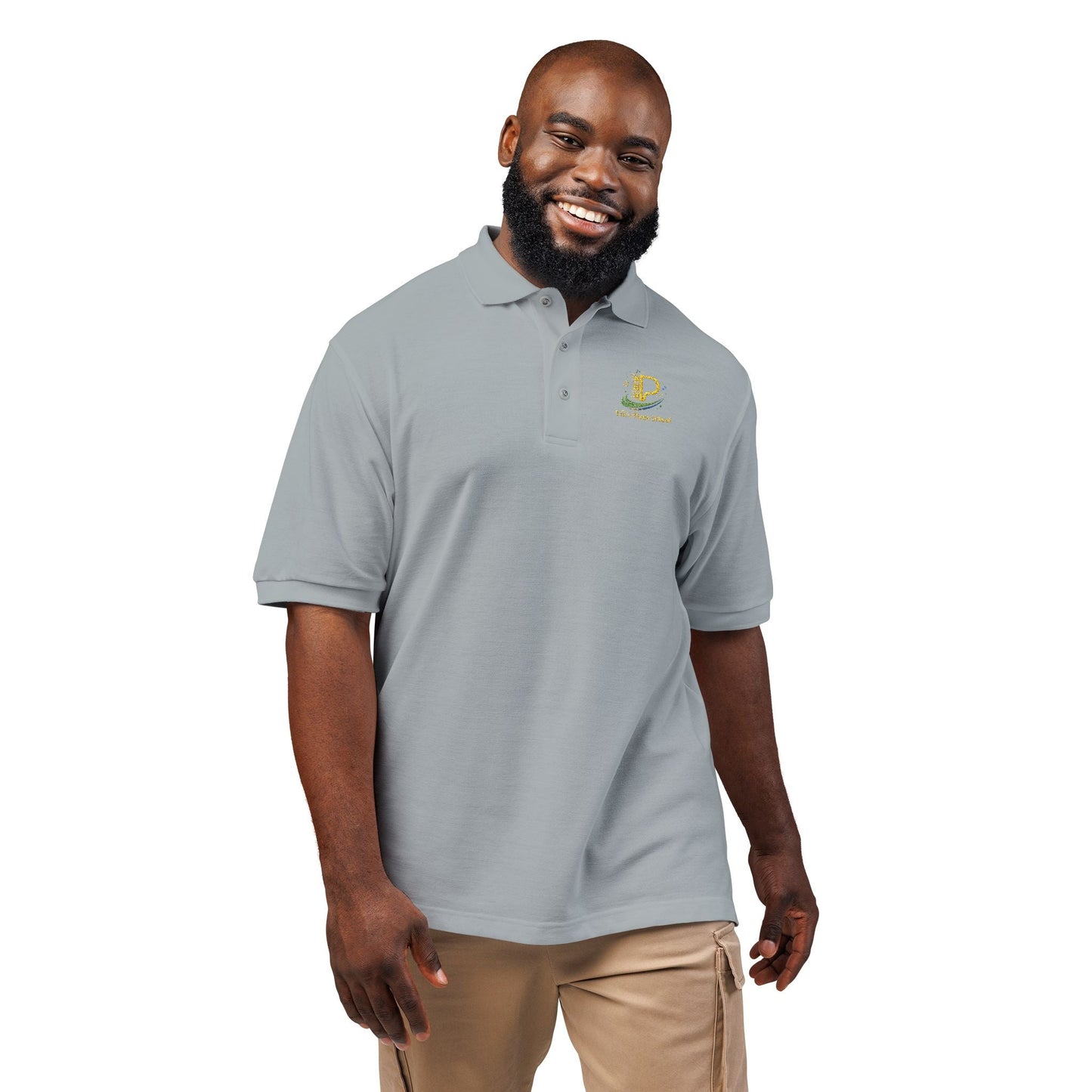 Lightweight embroidered crest polo shirt with metal buttons and side vents for breathability