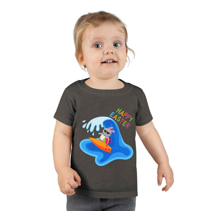 Toddler Happy Easter Surf Bunny Shirt with beach bunny graphic and rainbow text on blue tee
