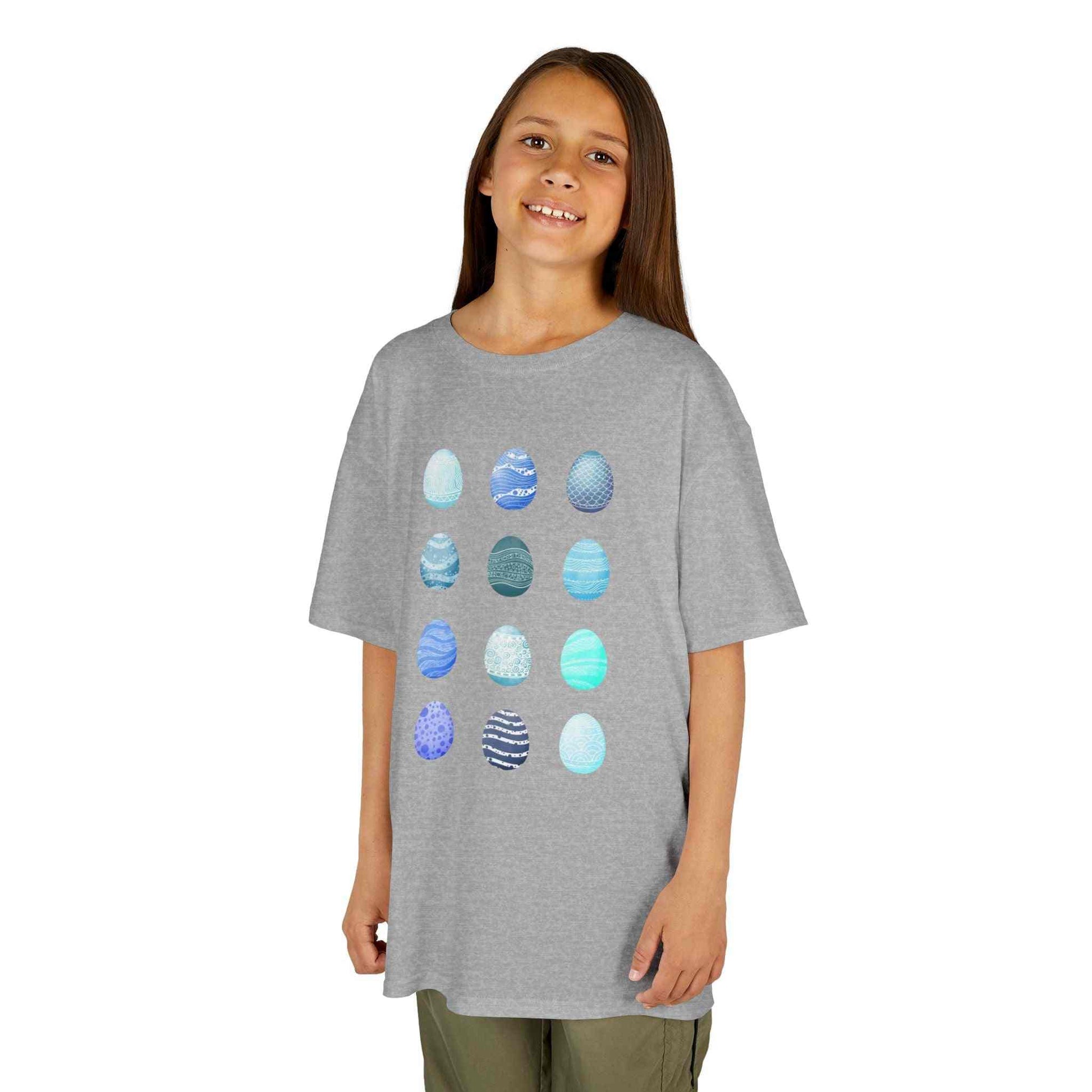 Kids t-shirt with blue watercolor egg pattern on soft white cotton fabric
