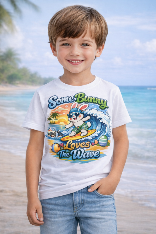 Toddler tee with cheerful surf bunny graphic titled Some Bunny Loves The Wave, made of soft cotton for kids.