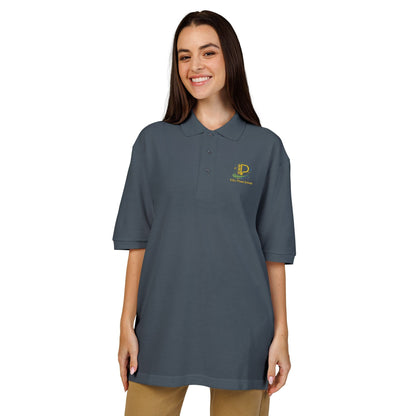 Embroidered crest polo shirt with relaxed fit, lightweight pique fabric, and subtle chest emblem