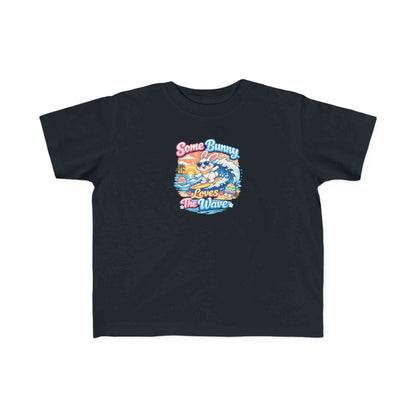 Youth girl Easter T-shirt with surfing bunny and pastel eggs, "Some Bunny Loves The Wave" design