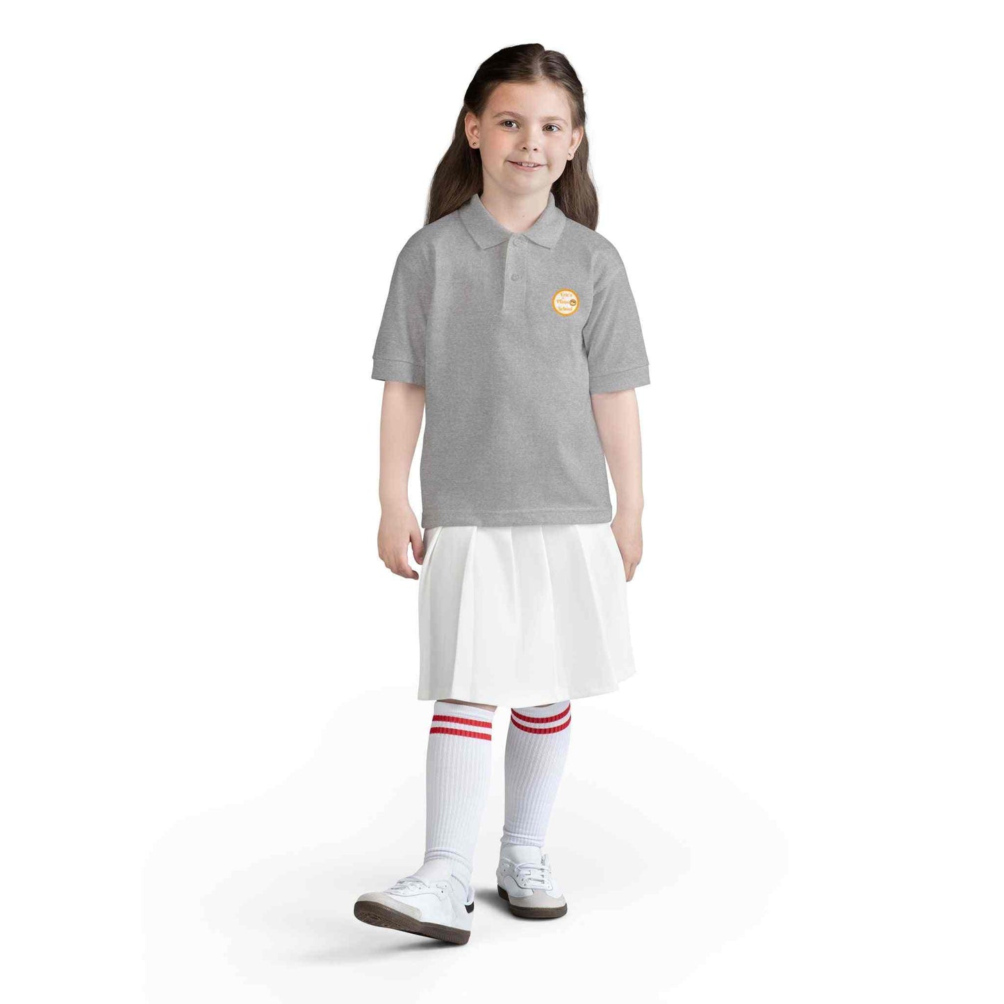 Gold youth polo shirt with Eric's Piano School logo for kids music lessons