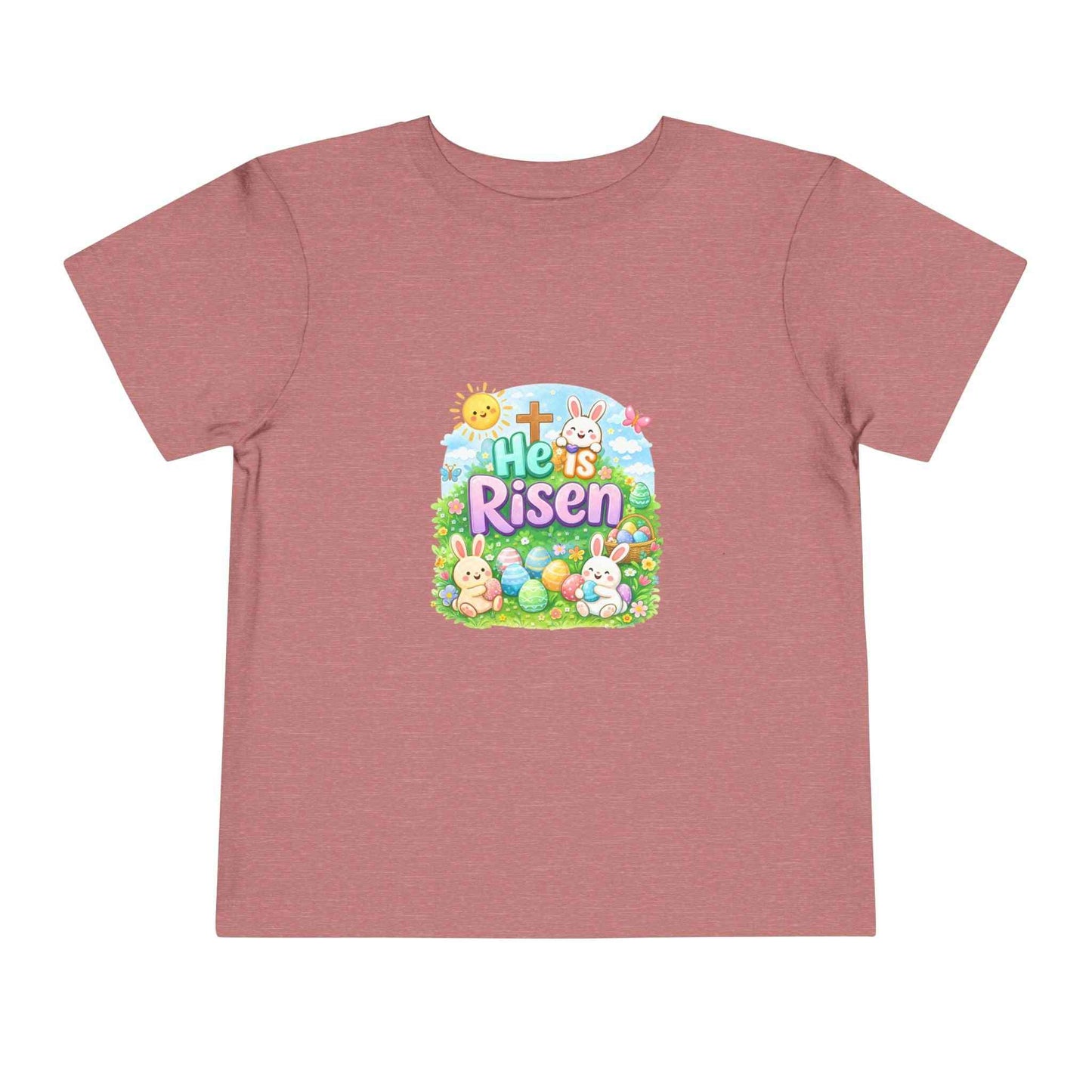 He Is Risen toddler tee with Easter bunny, cross, and pastel eggs design on soft cotton kids shirt