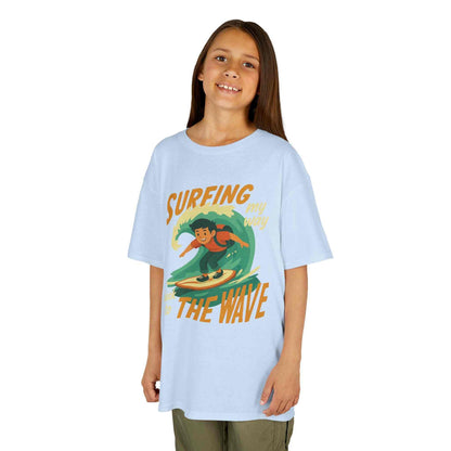 Kids Surfing The Wave T-Shirt with retro surfer graphic and vibrant colors on soft cotton fabric