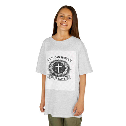 Kids tee with vintage Christian cross and "A Lot Can Happen in 3 Days" design on soft cotton shirt