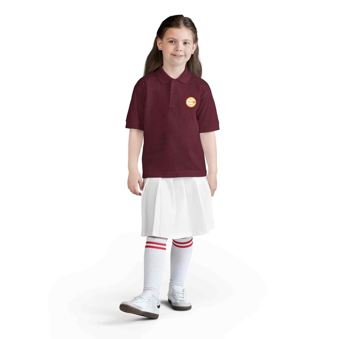 Youth polo shirt with gold Eric's Piano School logo for kids' music lessons