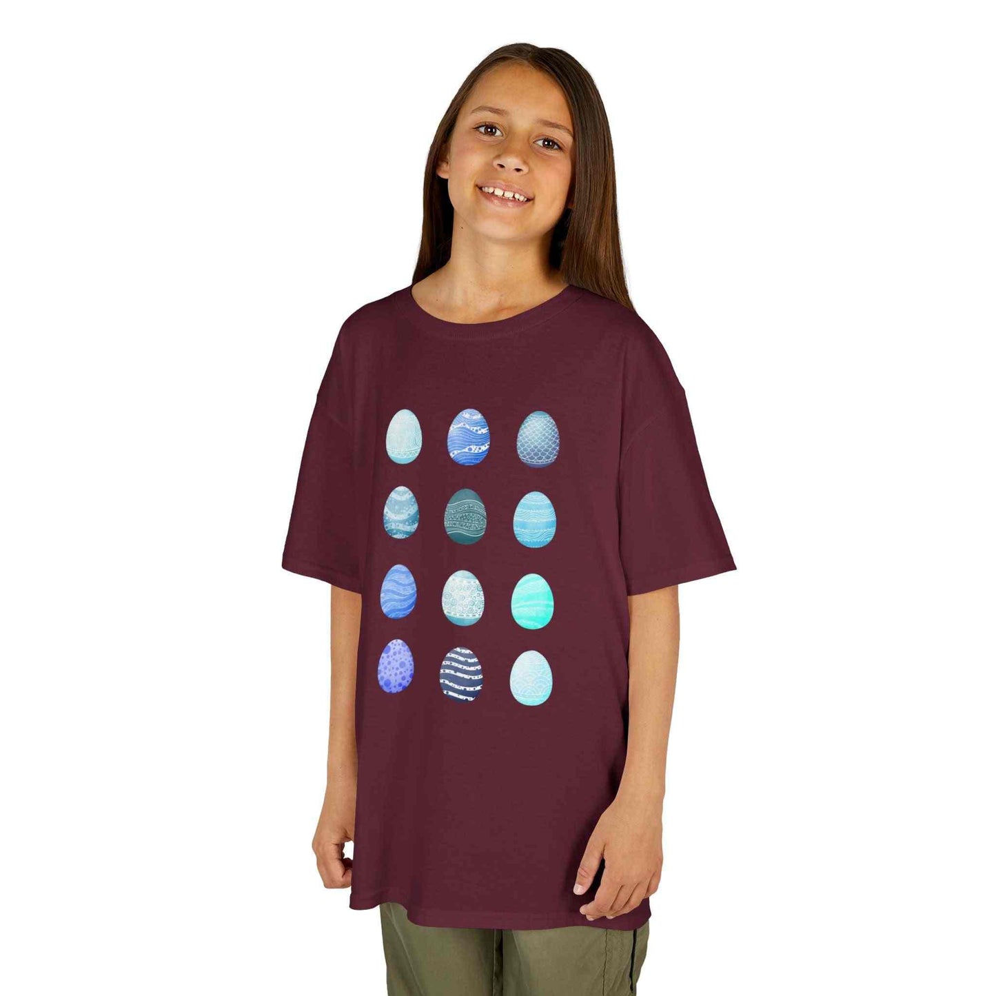 Kids tee with blue watercolor egg pattern on white cotton fabric