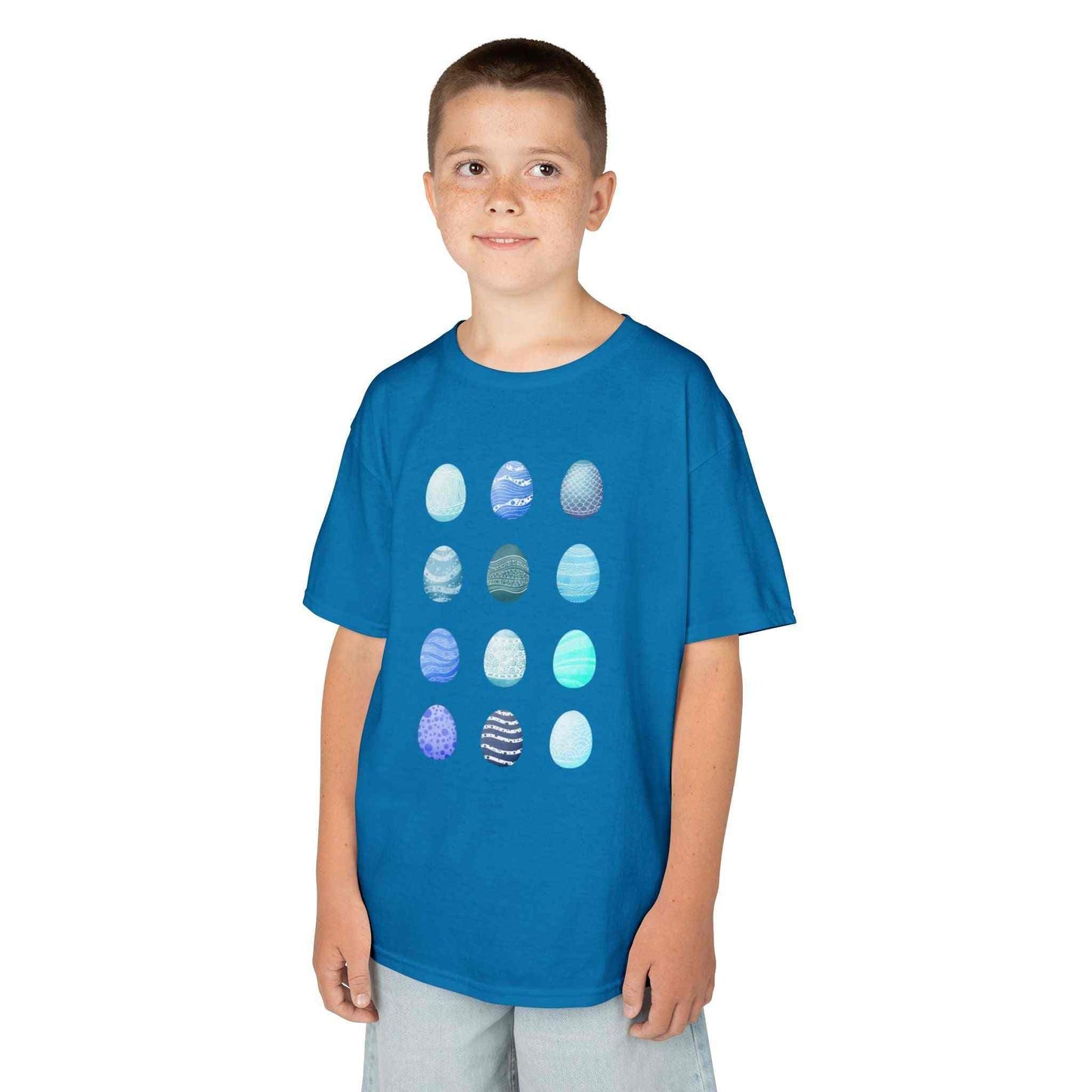 Kids tee with blue watercolor egg pattern on white cotton fabric
