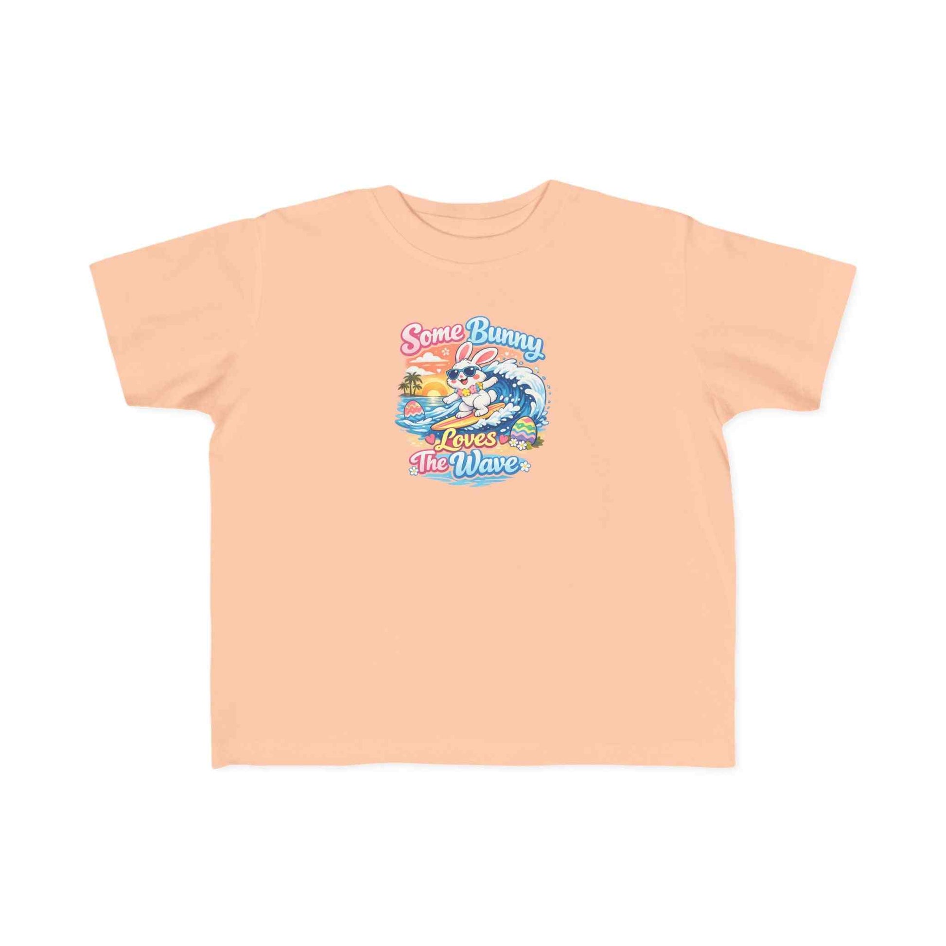 Youth girl Easter T-shirt with surfing bunny and pastel waves design, "Some Bunny Loves The Wave" print