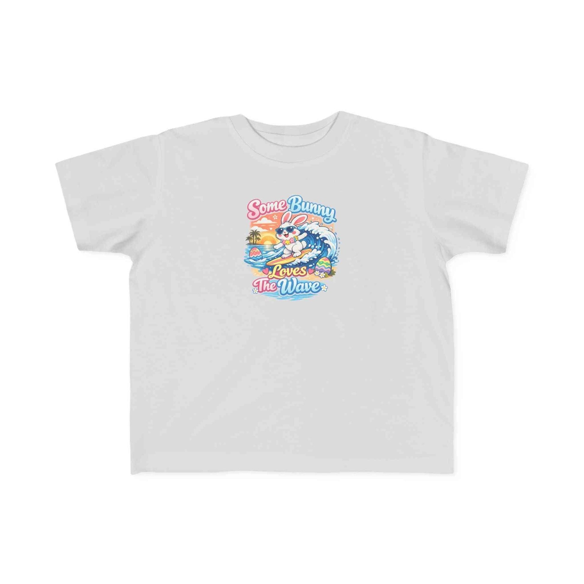 Cute surfing bunny Easter T-shirt with pastel eggs and sunset wave for school and beach spring celebrations
