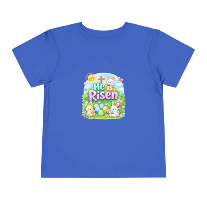 He Is Risen toddler tee with Easter bunny, cross, and pastel eggs design on soft lightweight fabric