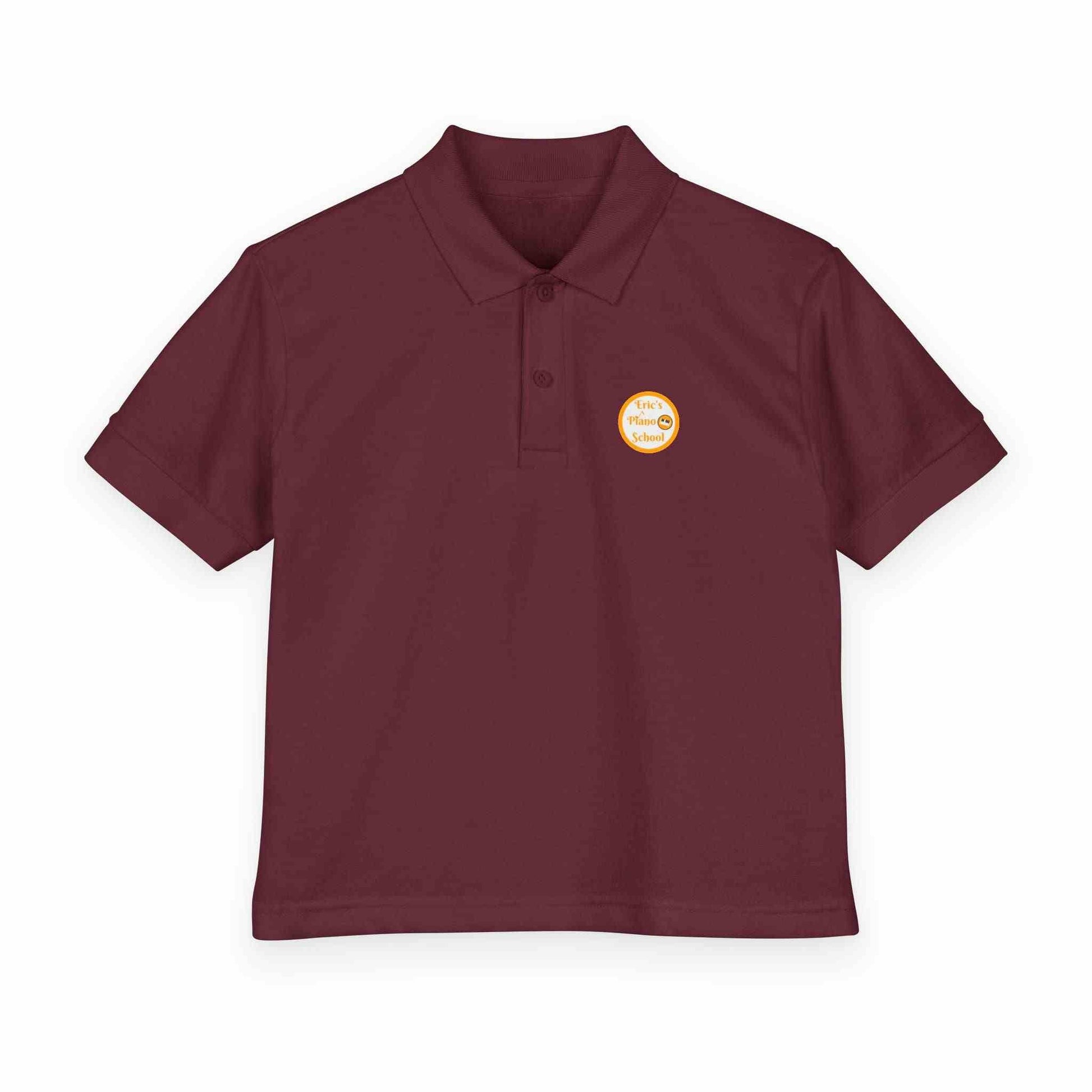Youth polo shirt with gold Eric's Piano School logo on soft moisture-wicking fabric