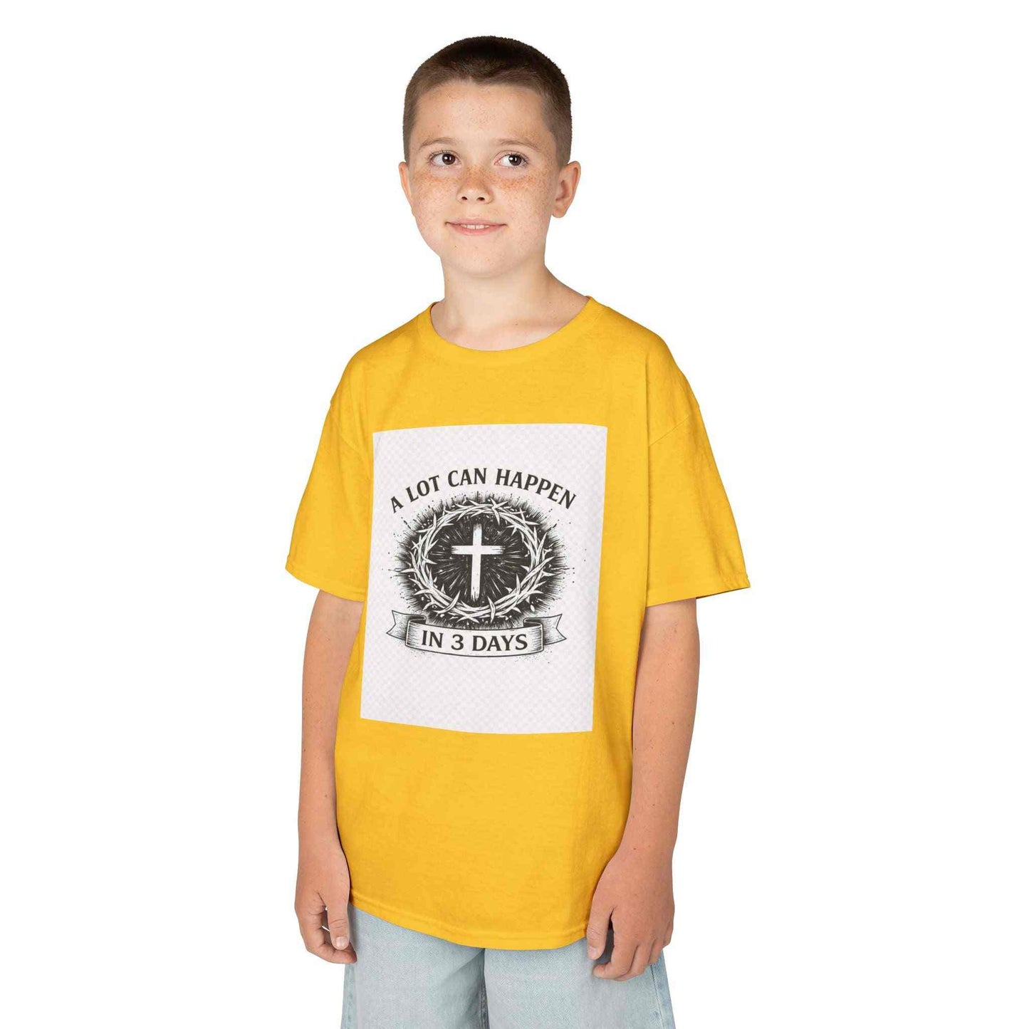 Kids tee with vintage cross and “A Lot Can Happen in 3 Days” design on soft midweight cotton