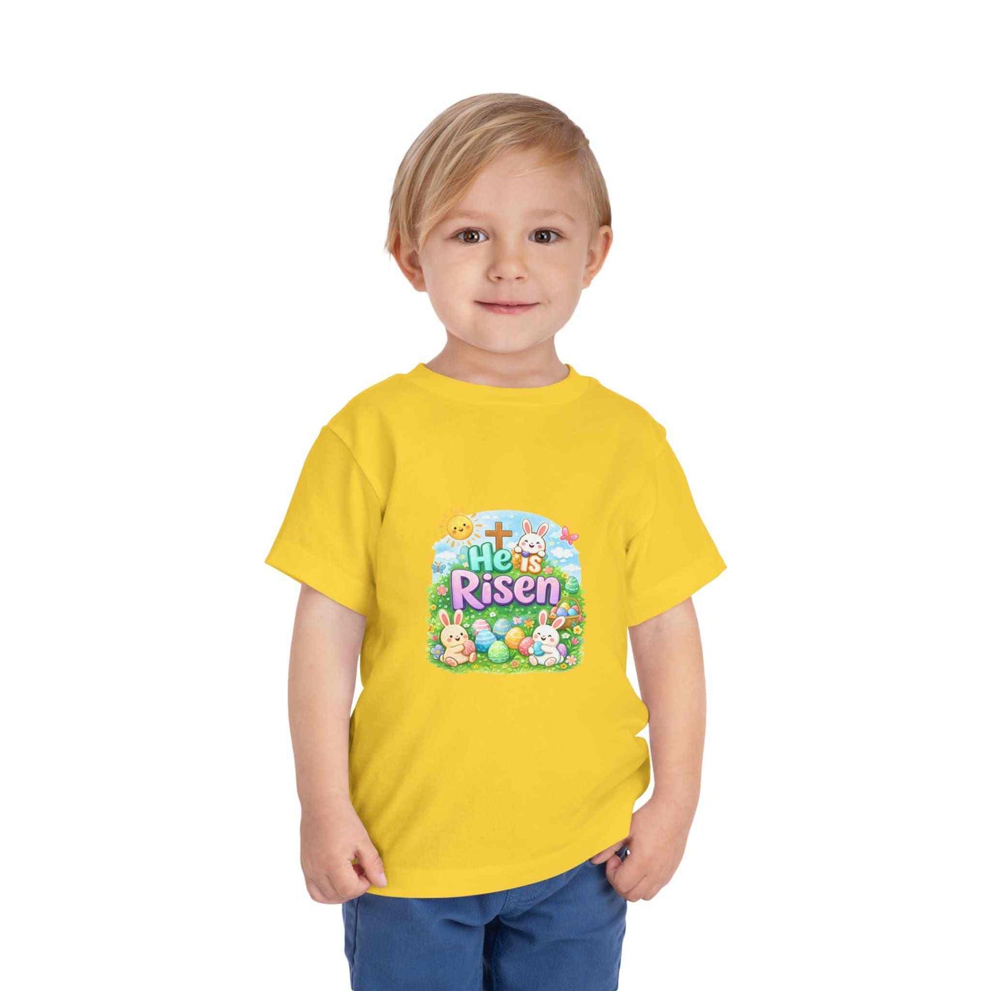 He Is Risen toddler tee with Easter bunny and cross design on soft pastel kids shirt
