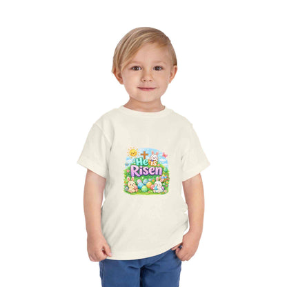 He Is Risen toddler tee with Easter bunny and cross design on soft pastel kids shirt