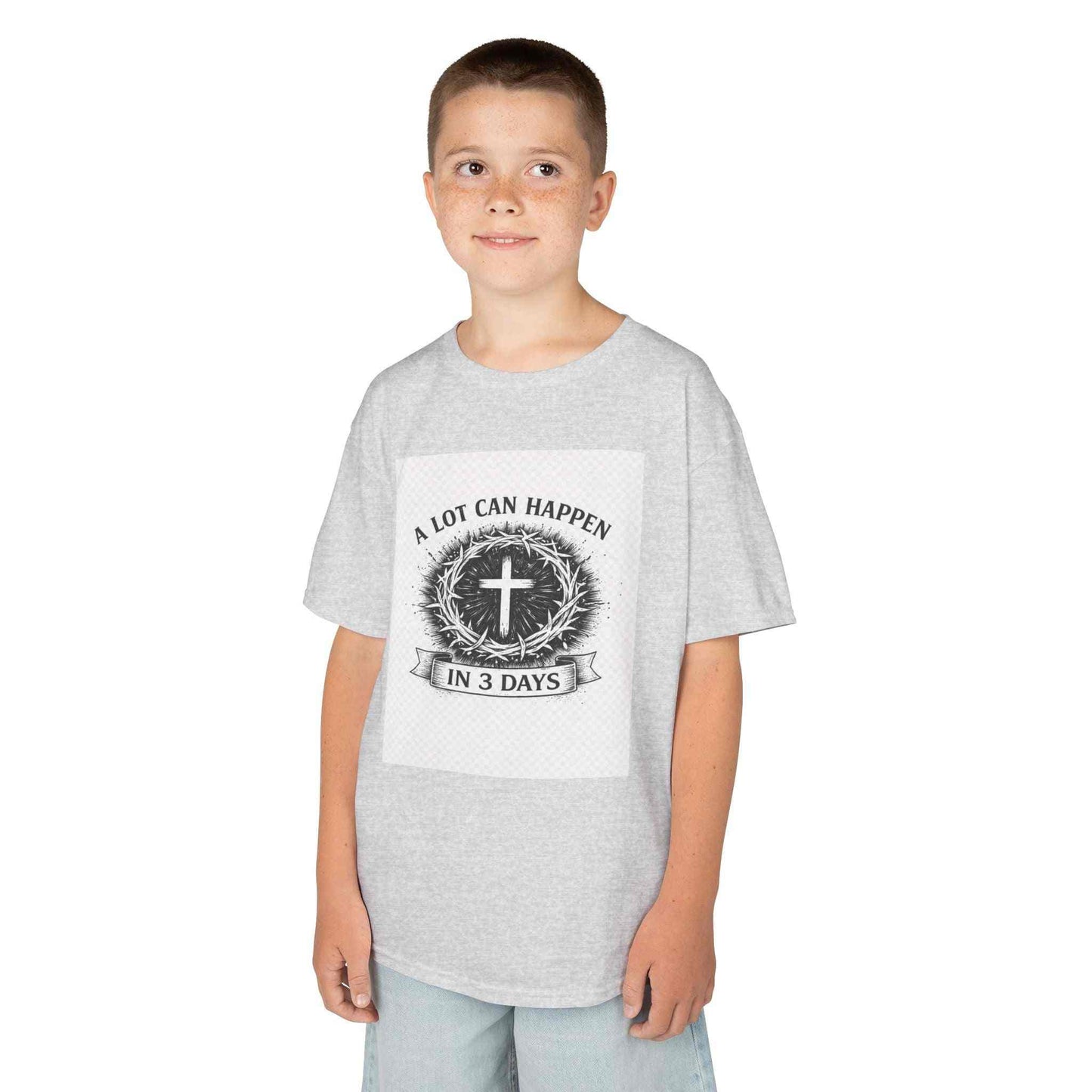 Kids tee with vintage cross and "A Lot Can Happen in 3 Days" faith-inspired design on soft cotton