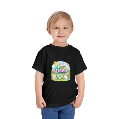 He Is Risen toddler tee with Easter bunny and cross design on soft pastel kids shirt