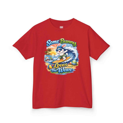 Youth boy’s Easter T-shirt with surfing bunny and sunset wave design, pastel colors, "Some Bunny Loves The Wave" text