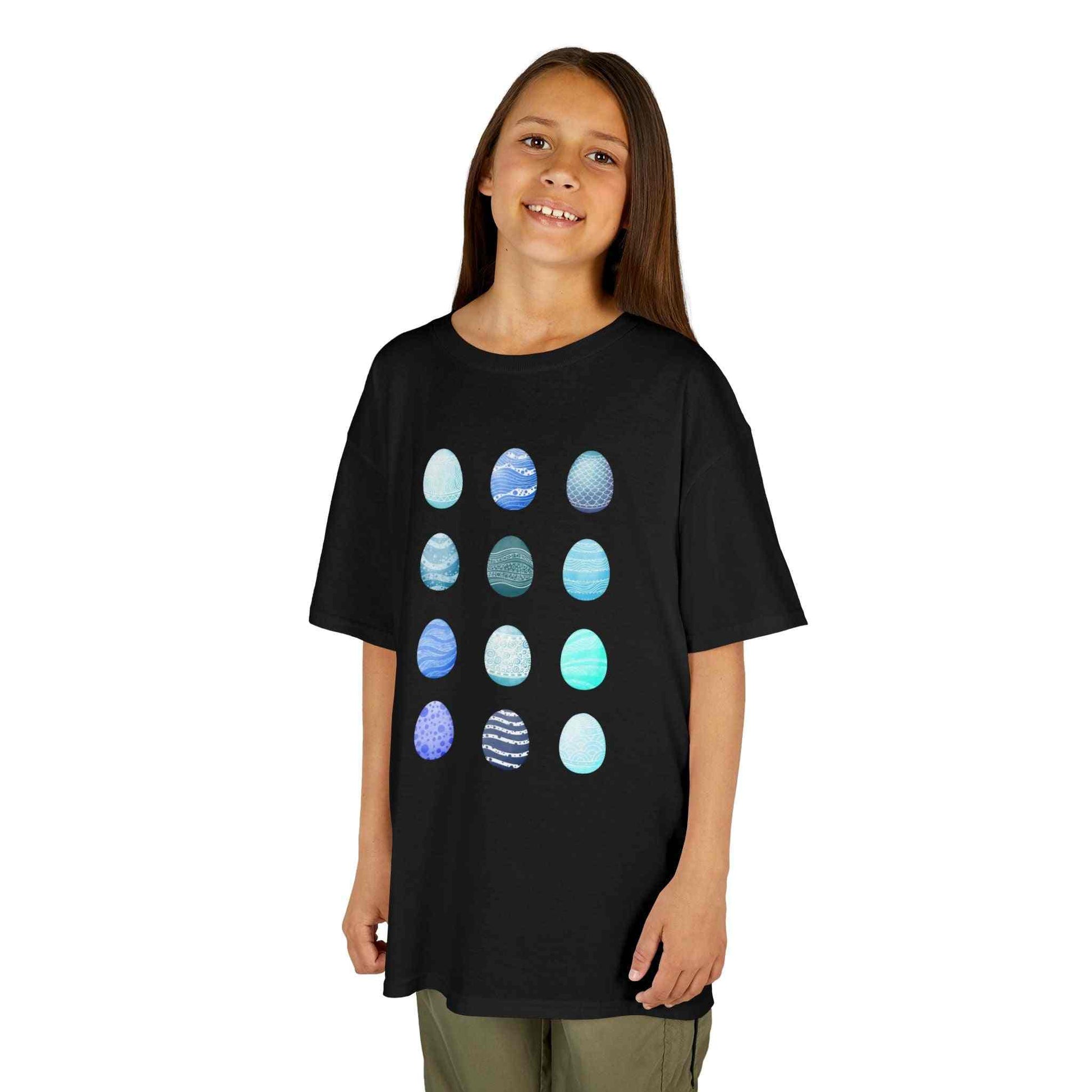 Kids tee with blue watercolor egg pattern on white cotton fabric