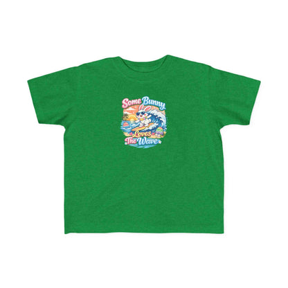 Some Bunny Loves The Wave Easter T-shirt with surfing bunny and pastel eggs on sunset wave background.